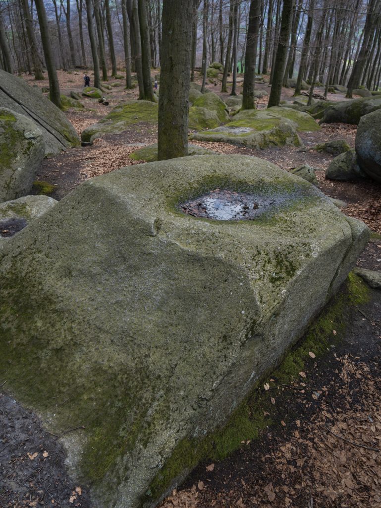 Stone with a bowl-shaped recess