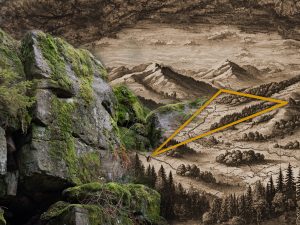 A rocky cliff covered in moss alongside a detailed vintage map illustration of a mountainous landscape with valleys and forests.